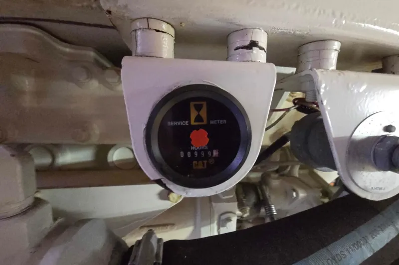 Slide: The Image of Hour meter on 2003 Riviera 48 Flybridge engine, showing 999 hours. - 13
