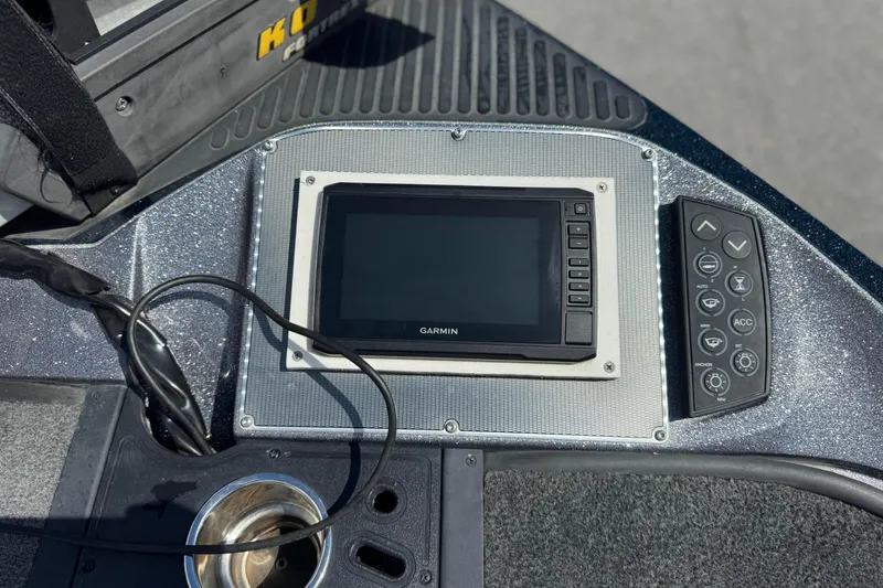 Slide: The Image of Control panel of a 2014 Ranger 520C boat with Garmin display and buttons. - 7