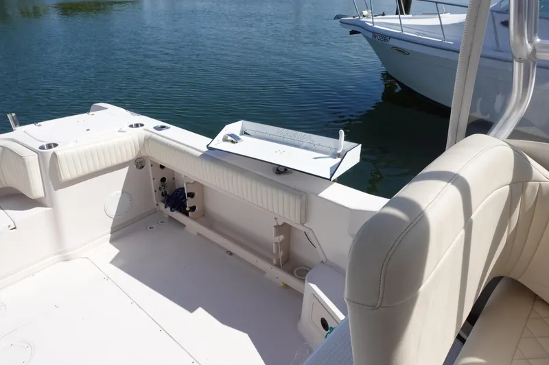 Slide: The Image of 2002 Grady White 300 Marlin boat interior with seating and water view. - 10