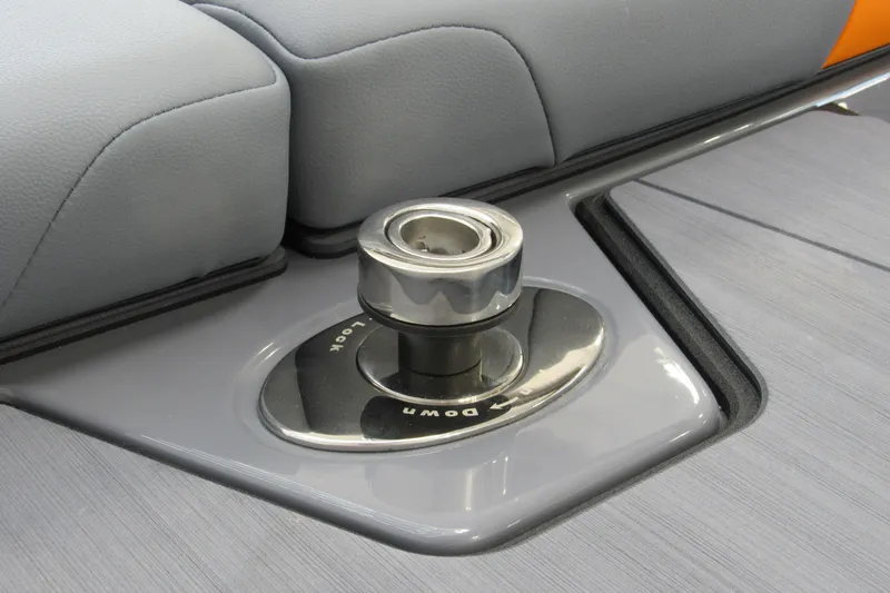 Slide: The Image of 2025 Axis T220 boat detail showing a sleek, modern cleat on deck. - 13