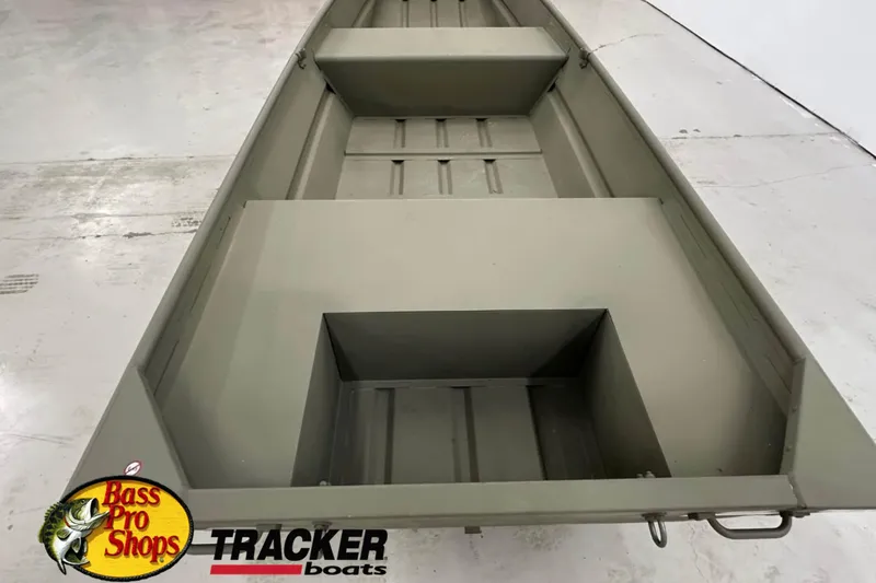 Slide: The Image of 2026 Tracker Grizzly 14 Jon boat interior, featuring Bass Pro Shops and Tracker Boats logos. - 2