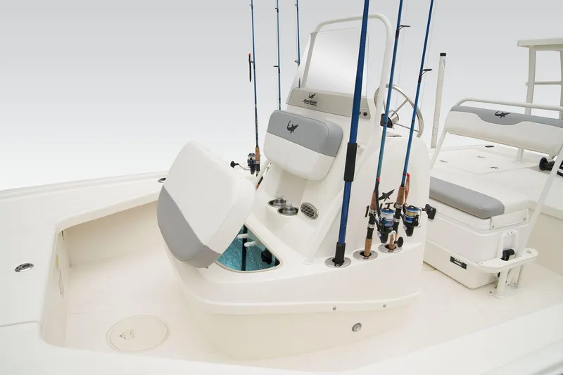 Slide: The Image of 2025 Mako 18 LTS boat interior with steering console and seating. - 21