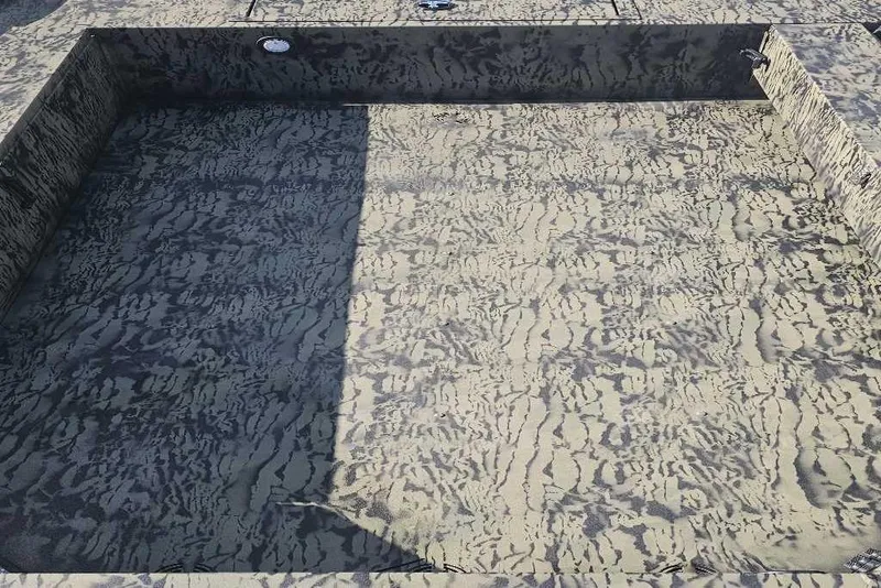 Slide: The Image of 2026 Tracker Grizzly 1654 T Sportsman boat interior with camouflage pattern. - 3