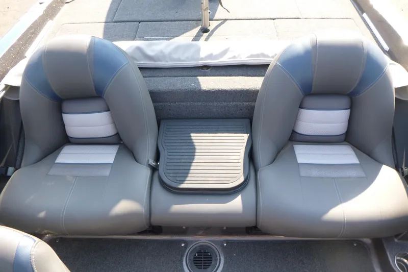 Slide: The Image of 2024 Ranger 212LS boat interior with two gray seats and a central step. - 11