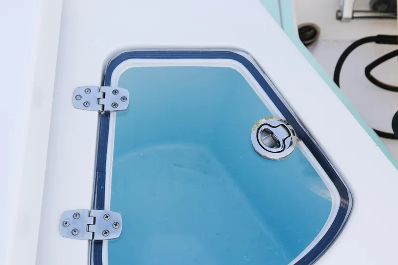 Slide: The Image of 2017 Albury Brothers center console boat hatch with metal hinges and latch. - 20