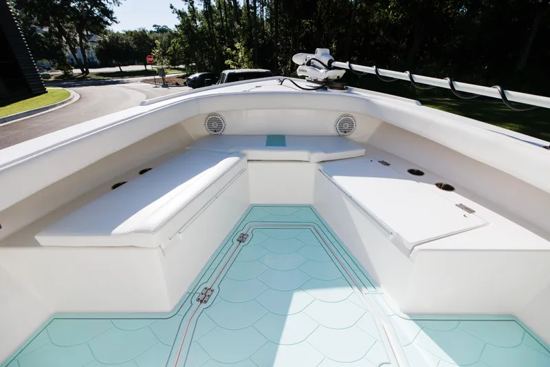 Slide: The Image of 2017 Albury Brothers center console boat with spacious seating and light blue deck. - 24