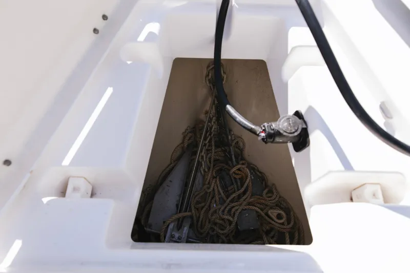 Slide: The Image of 2017 Albury Brothers center console anchor storage with ropes and equipment. - 25