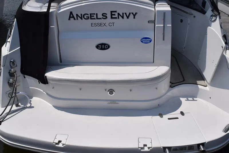 Slide: The Image of 2010 Rinker 310 Express Cruiser boat stern with "Angels Envy" name, Essex, CT. - 5