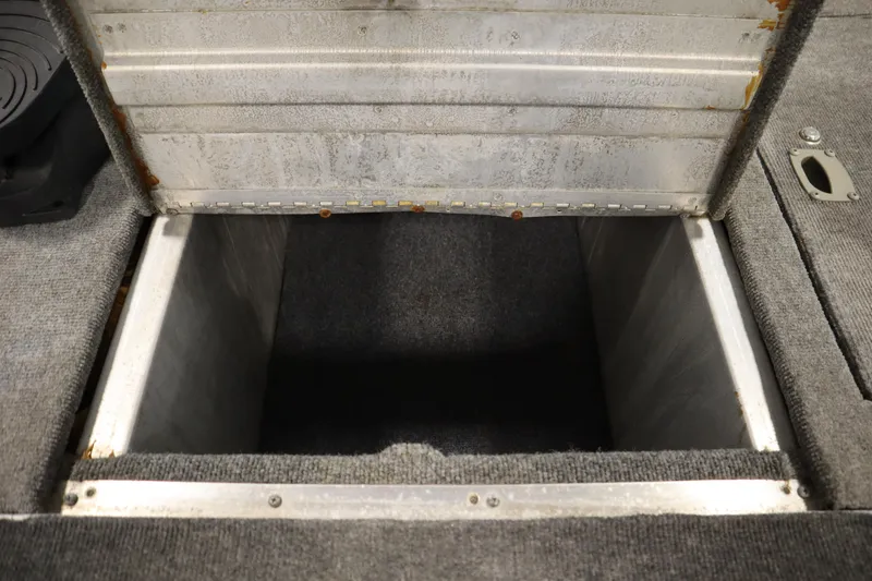 Slide: The Image of Open storage compartment in 1997 Tracker 18 Pro Team SC boat. - 19