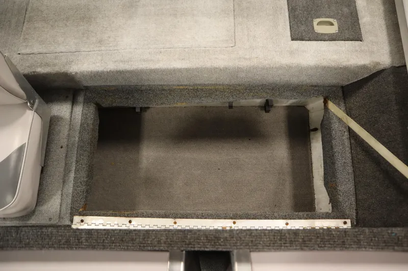 Slide: The Image of 1997 Tracker 18 Pro Team SC boat interior storage compartment. - 34