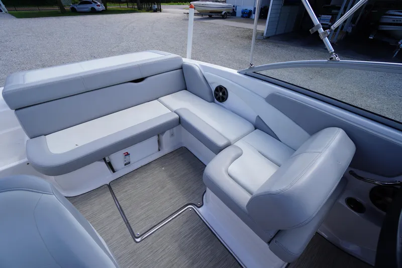 Slide: The Image of 2019 Regal 1900 ES Bowrider interior with gray seating and modern design. - 11
