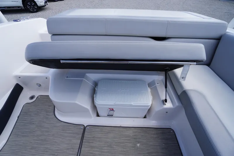 Slide: The Image of 2019 Regal 1900 ES Bowrider interior with storage compartment and cooler. - 12