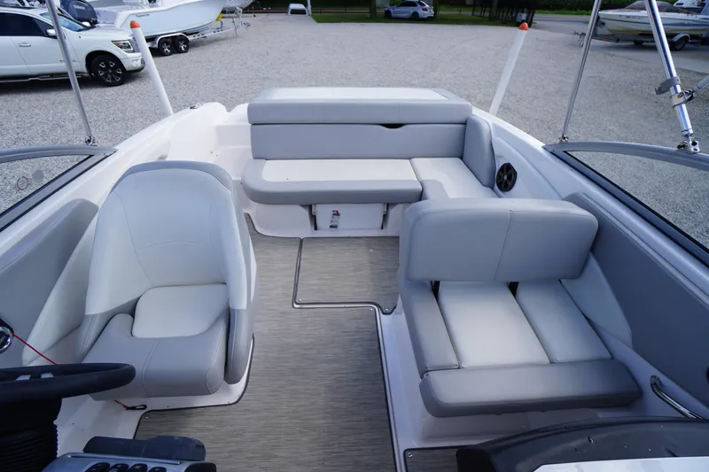 Slide: The Image of 2019 Regal 1900 ES Bowrider interior with gray seating and modern design. - 14