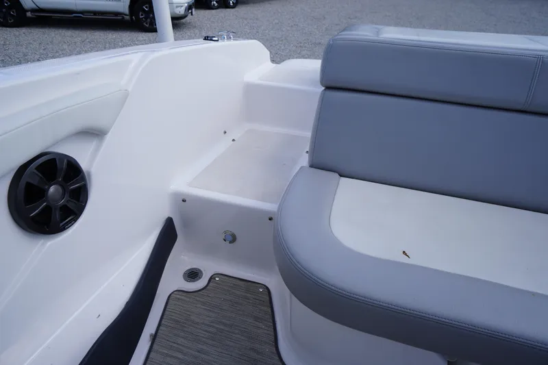 Slide: The Image of 2019 Regal 1900 ES Bowrider interior with gray seating and speaker detail. - 15