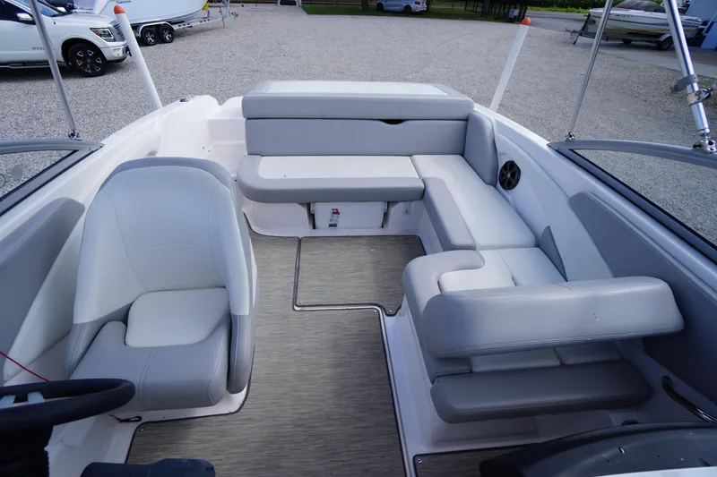 Slide: The Image of 2019 Regal 1900 ES Bowrider interior with gray seating and modern design. - 17