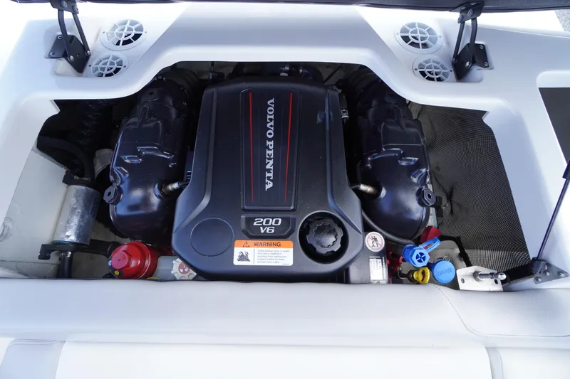 Slide: The Image of 2019 Regal 1900 ES Bowrider engine compartment with Volvo Penta 200 V6 engine. - 21