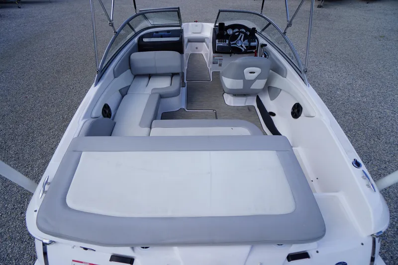 Slide: The Image of 2019 Regal 1900 ES Bowrider interior with spacious seating and modern dashboard. - 22