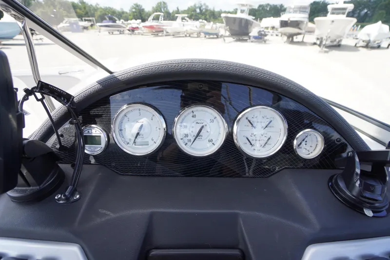 Slide: The Image of Dashboard of 2019 Regal 1900 ES Bowrider with gauges and controls. - 5