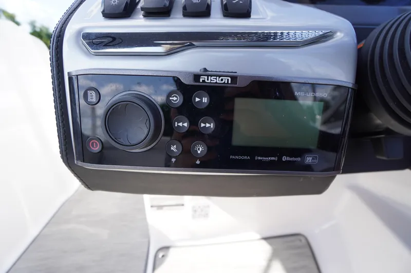 Slide: The Image of Fusion audio system on 2019 Regal 1900 ES Bowrider boat dashboard. - 6