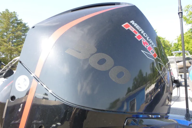 Slide: The Image of 2024 Ranger 621FS Pro with Mercury Pro 300 outboard engine, close-up view. - 13