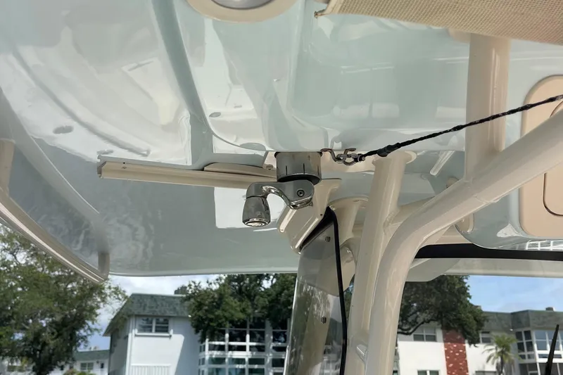 Slide: The Image of 2022 Grady-White Canyon 271 boat interior, featuring a mounted light fixture and support structure. - 23