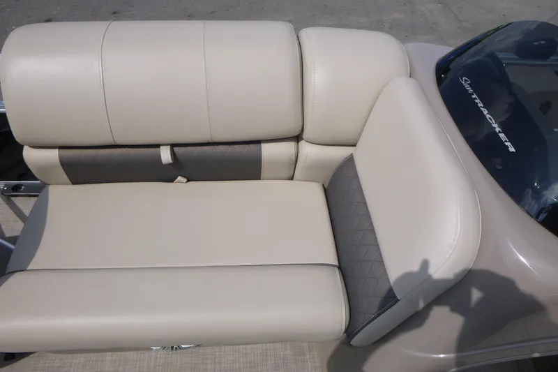 Slide: The Image of 2022 Sun Tracker Fishin' Barge 20 DLX beige and gray seating detail. - 10