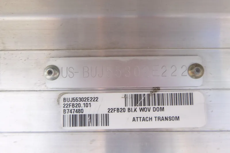 Slide: The Image of 2022 Sun Tracker Fishin' Barge 20 DLX identification plate with serial number and barcode. - 13