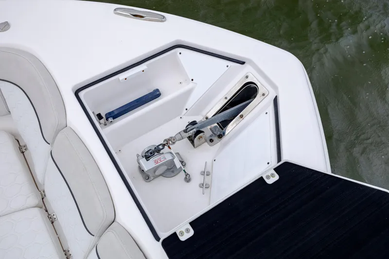 Slide: The Image of 2022 Sea Fox 368 Commander anchor compartment with seating, on calm water. - 13