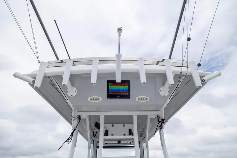 Slide: The Image of 2022 Sea Fox 368 Commander boat with advanced navigation equipment and rod holders. - 18