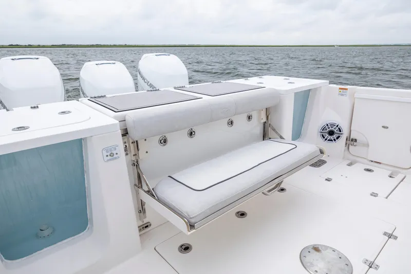 Slide: The Image of 2022 Sea Fox 368 Commander boat interior with seating and outboard motors. - 35