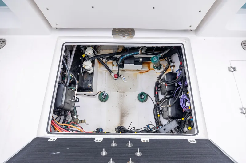 Slide: The Image of Engine compartment of 2022 Sea Fox 368 Commander boat, showcasing wiring and components. - 37