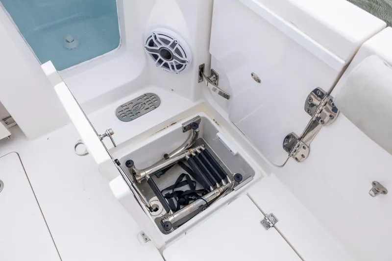 Slide: The Image of 2022 Sea Fox 368 Commander boat storage compartment with ladder and speaker. - 38