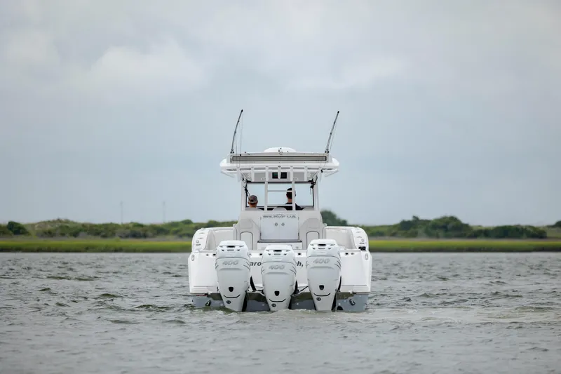 Slide: The Image of 2022 Sea Fox 368 Commander boat with triple engines on open water. - 4