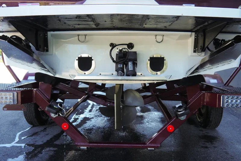 Slide: The Image of 2023 MasterCraft XT20 boat trailer and propeller detail. - 5