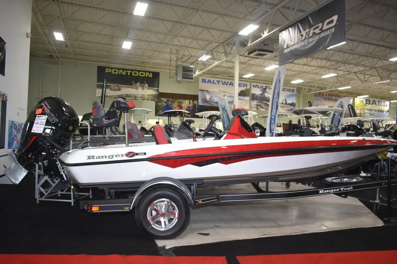 The Image of 2025 Ranger Z185 boat displayed indoors, featuring sleek design and vibrant red accents. - 0