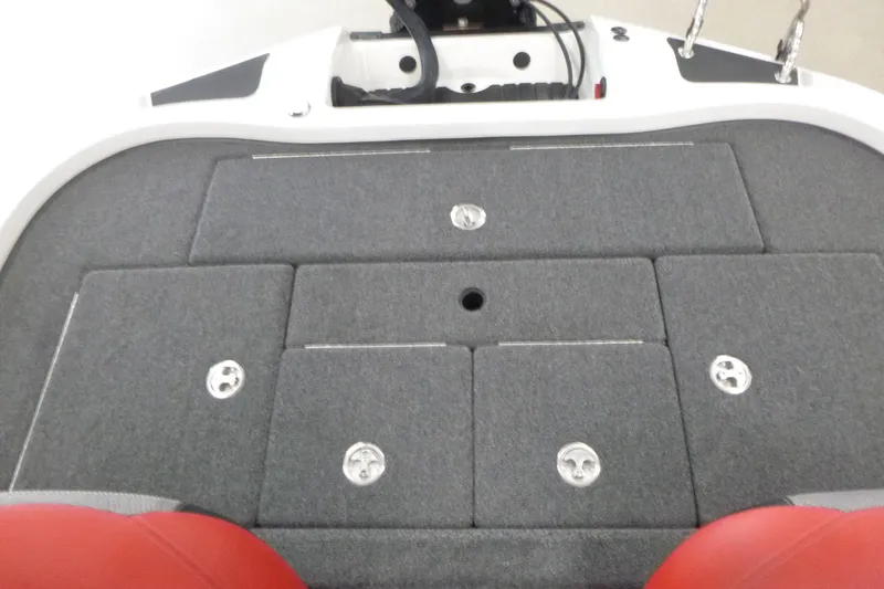 Slide: The Image of 2025 Ranger Z185 boat storage compartments with open lids, showcasing interior space. - 12
