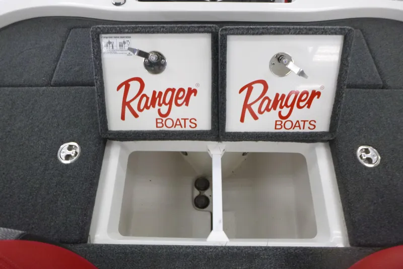 Slide: The Image of 2025 Ranger Z185 boat deck with storage compartments and red seating. - 13