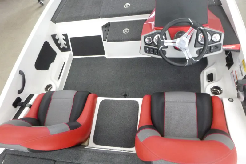 Slide: The Image of 2025 Ranger Z185 boat dashboard with steering wheel and control panel. - 8