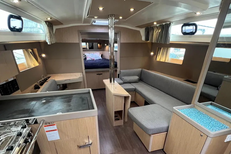 Slide: The Image of Interior of 2019 Beneteau Oceanis 41.1 yacht with modern furnishings and spacious layout. - 2