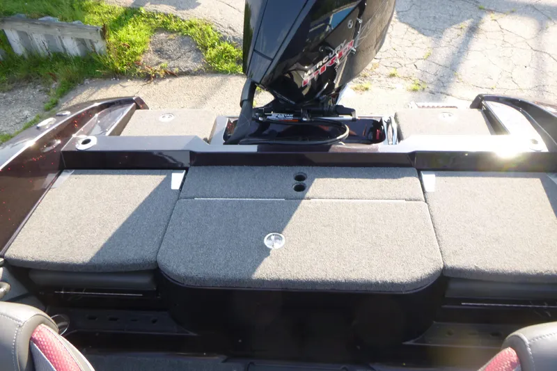 Slide: The Image of 2024 Ranger 2080MS boat with Mercury engine, featuring spacious rear deck and seating. - 12