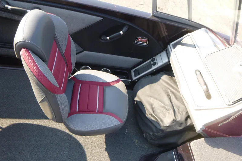 Slide: The Image of 2024 Ranger 2080MS boat interior with red and gray seating and storage area. - 8
