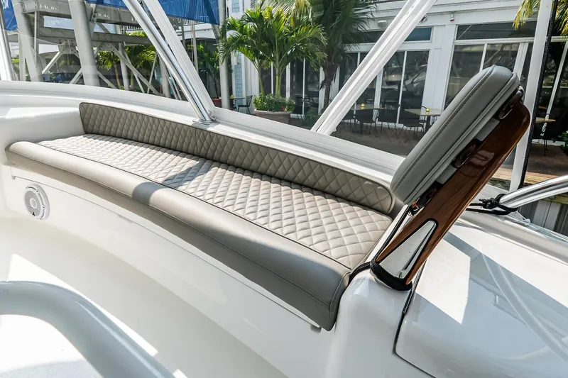 Slide: The Image of Luxurious seating on 2025 Viking 64 Convertible yacht, featuring quilted upholstery and sleek design. - 42