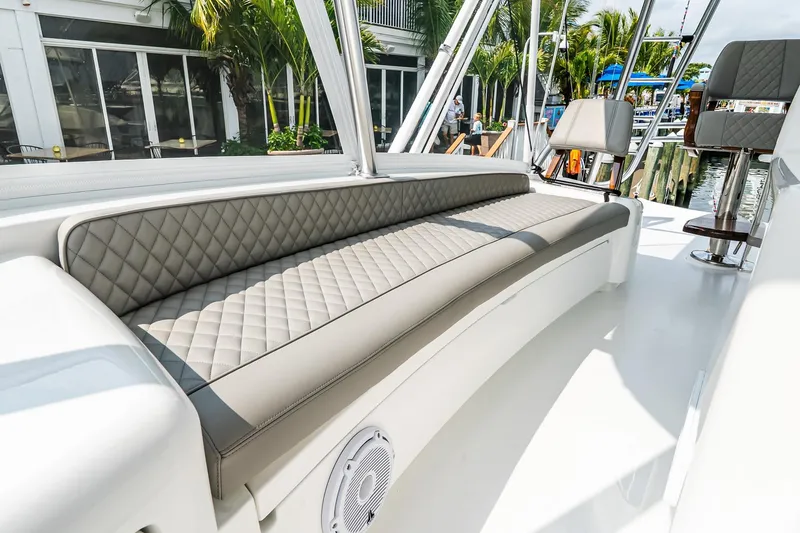 Slide: The Image of Luxurious seating on 2025 Viking 64 Convertible yacht, featuring elegant quilted upholstery. - 44