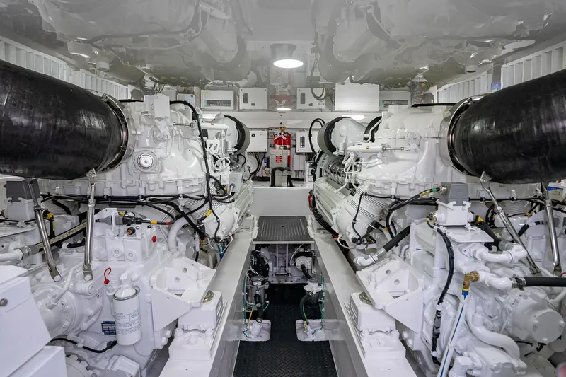 Slide: The Image of Engine room of 2026 Viking 64 Convertible yacht, showcasing advanced machinery and systems. - 81