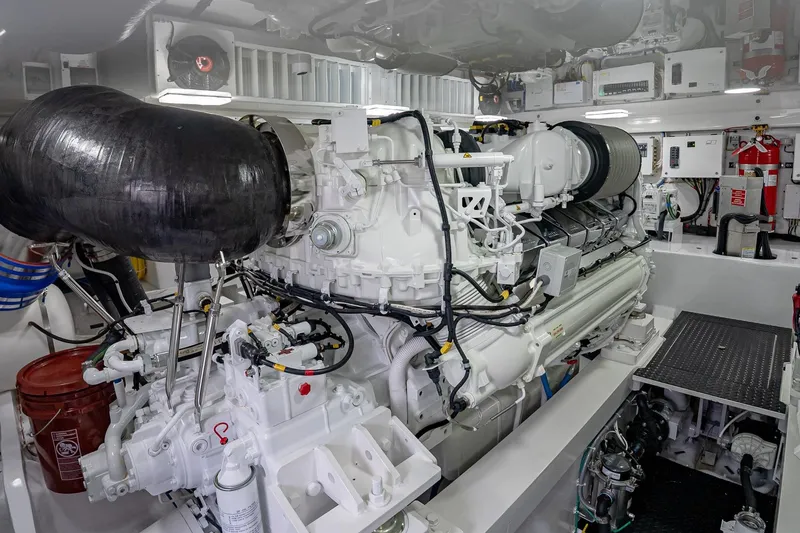 Slide: The Image of Engine room of 2026 Viking 64 Convertible yacht, showcasing advanced machinery and equipment. - 82