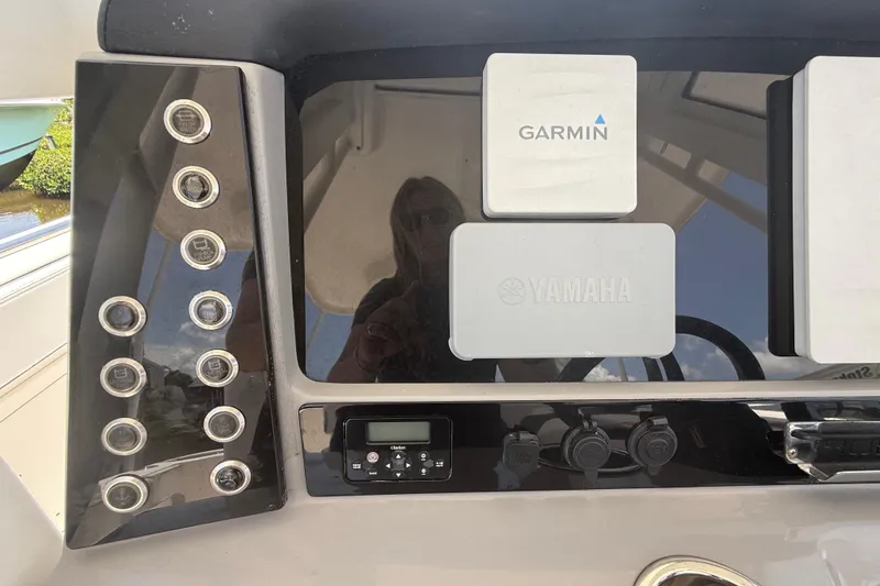 Slide: The Image of Dashboard of 2020 Robalo R272 Center Console with Garmin and Yamaha controls. - 10