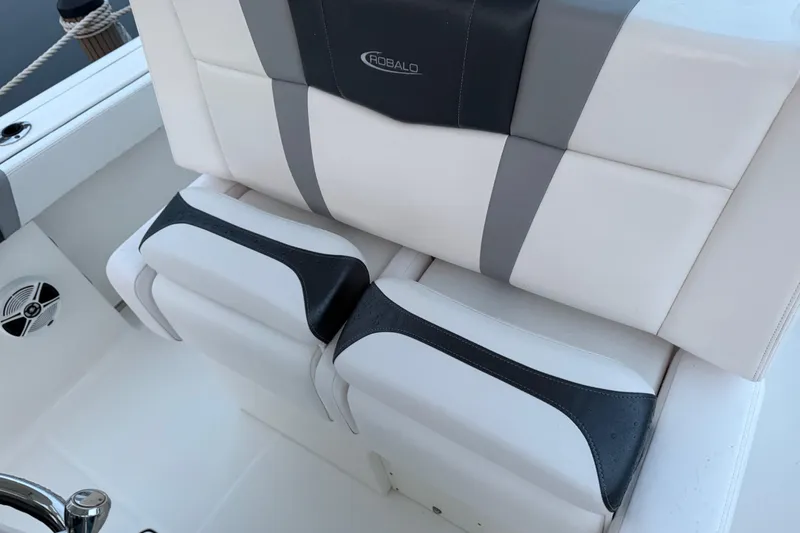 Slide: The Image of 2020 Robalo R272 Center Console boat seating with stylish upholstery design. - 13
