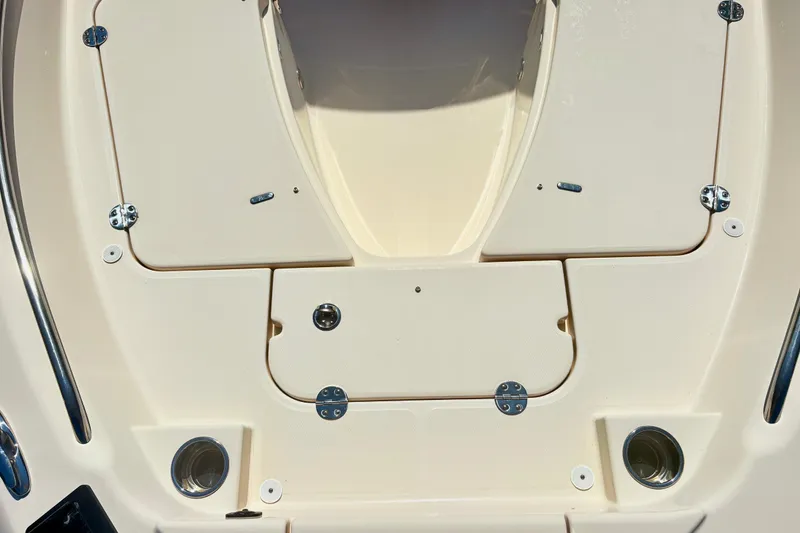 Slide: The Image of 2022 Grady-White 251 Coastal Explorer boat deck with storage compartments. - 15