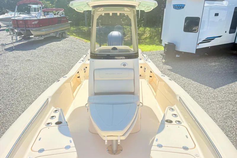Slide: The Image of 2022 Grady-White 251 Coastal Explorer boat interior, featuring spacious seating and modern design. - 16