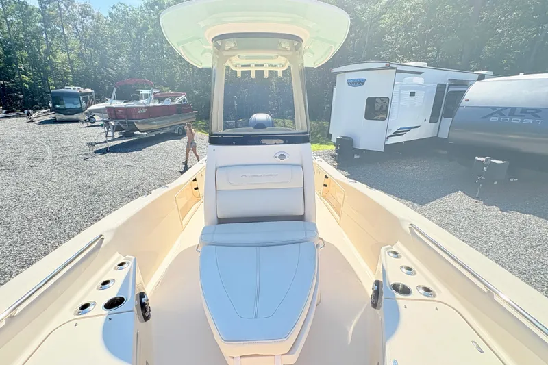 Slide: The Image of 2022 Grady-White 251 Coastal Explorer boat in a sunny outdoor setting. - 17